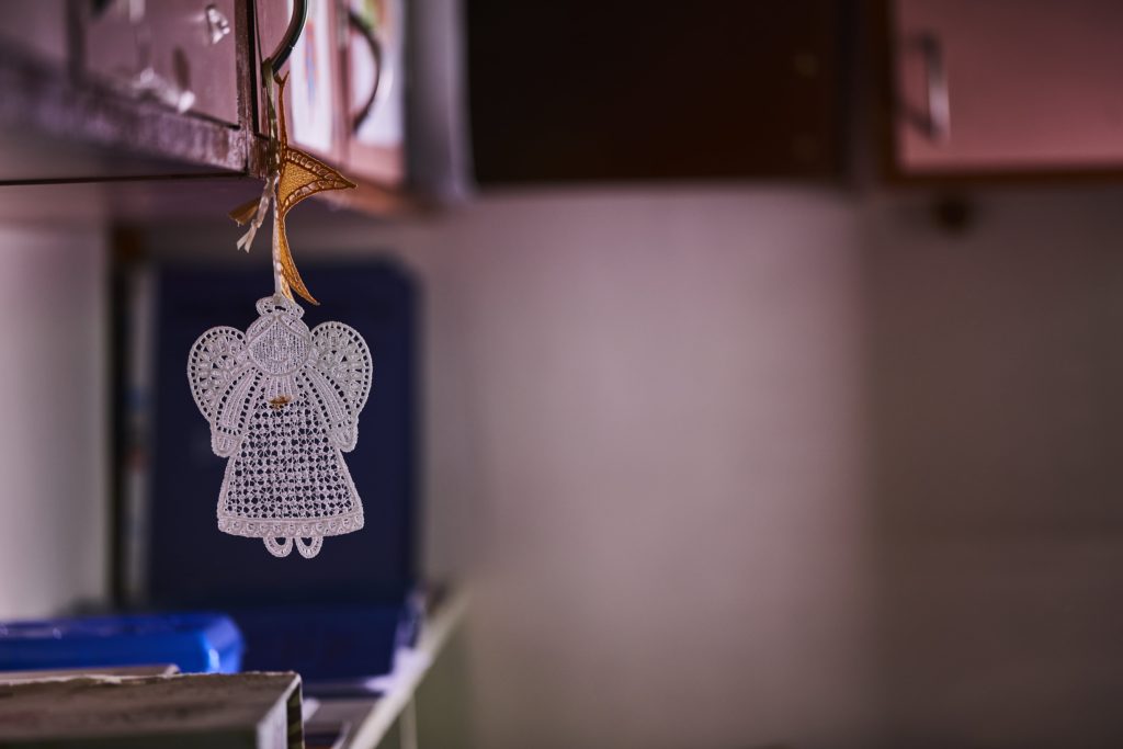 A complex crochet design executed by the handicraft center, for which the screen print for which was made possible.