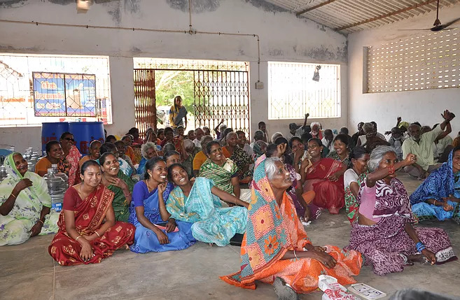 Women at the leprosy colony enjoying themselves at a meeting conducted for families of leprosy patients.