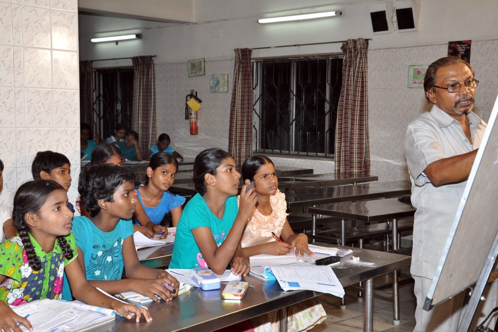 A tutoring session in progress for some of the younger students.
